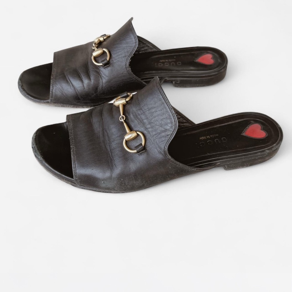 Gucci Black Leather Mules with Gold Accents